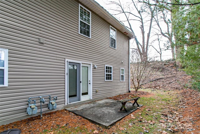 rear view of property with a patio area