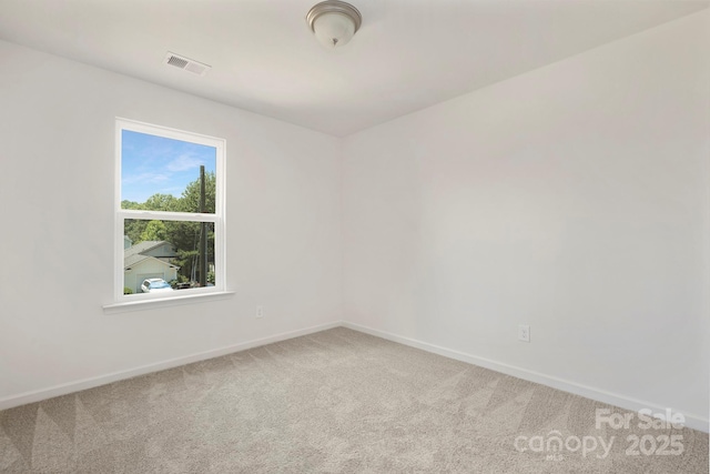 unfurnished room with carpet flooring