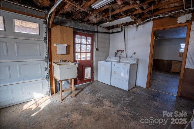 washroom featuring sink and washing machine and dryer