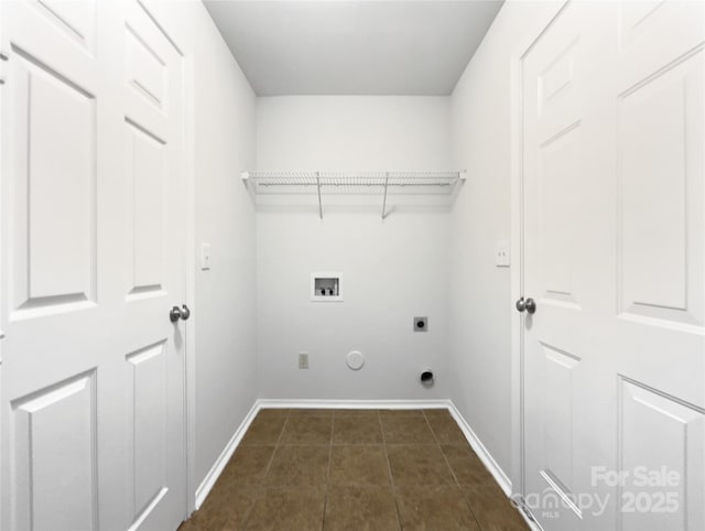 clothes washing area featuring washer hookup, dark tile patterned flooring, hookup for a gas dryer, and hookup for an electric dryer