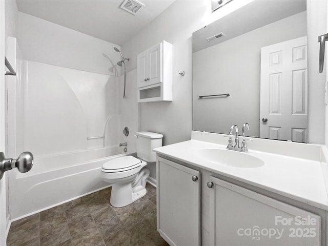 full bathroom with vanity, toilet, and washtub / shower combination