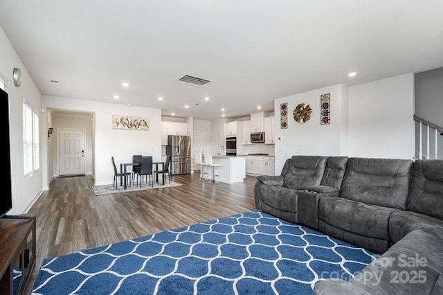 living room featuring hardwood / wood-style flooring