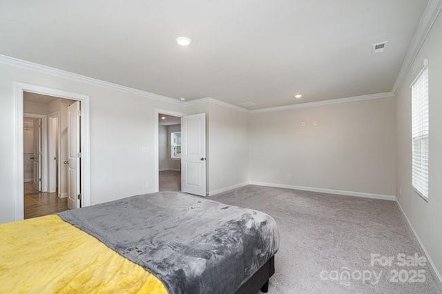 carpeted bedroom featuring ornamental molding