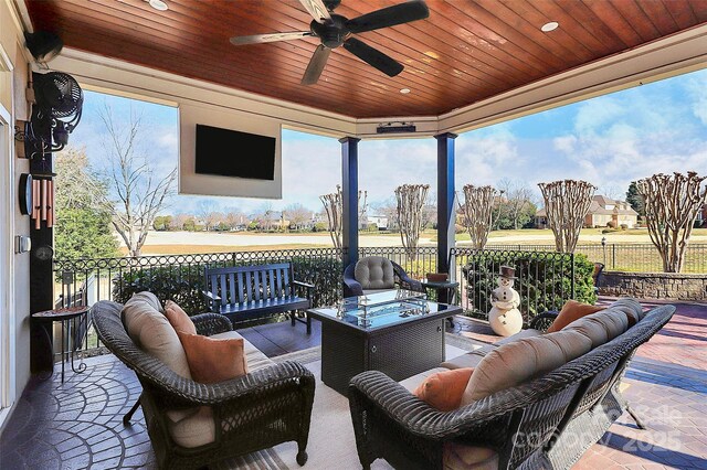 view of patio / terrace featuring an outdoor living space and ceiling fan