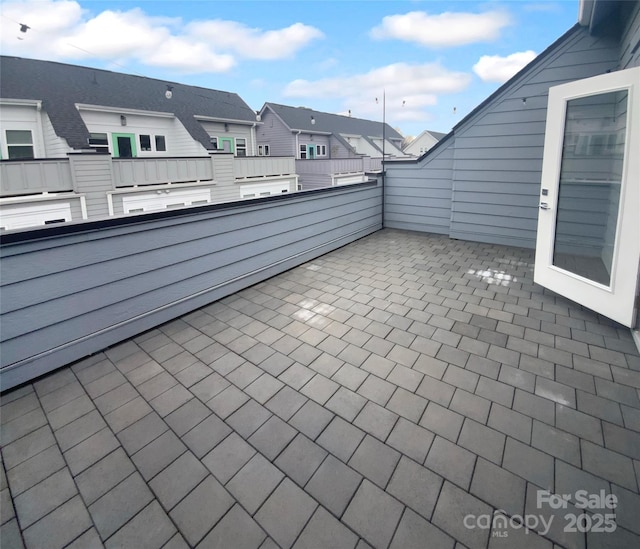 view of patio with a balcony