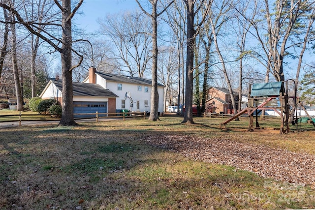 view of yard featuring a garage