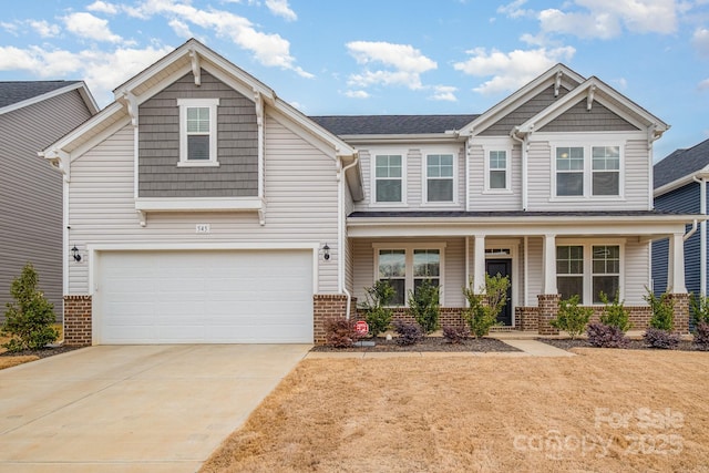 craftsman-style house featuring a garage and a porch