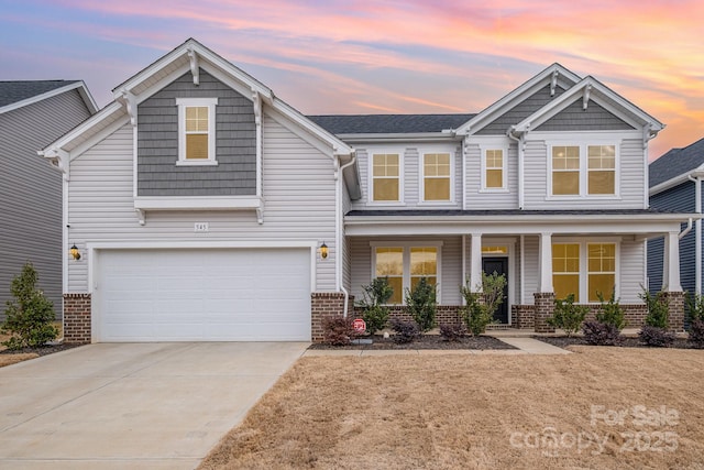 craftsman house featuring a garage