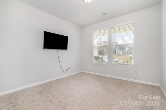 view of carpeted spare room