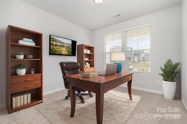 home office featuring light carpet