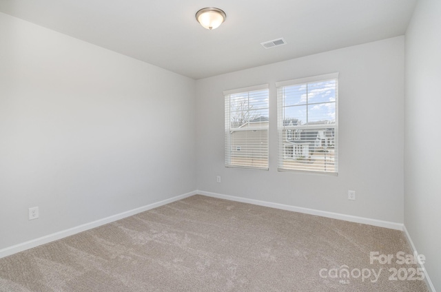 view of carpeted spare room