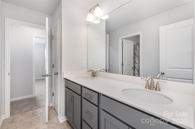 bathroom featuring vanity and tile patterned flooring