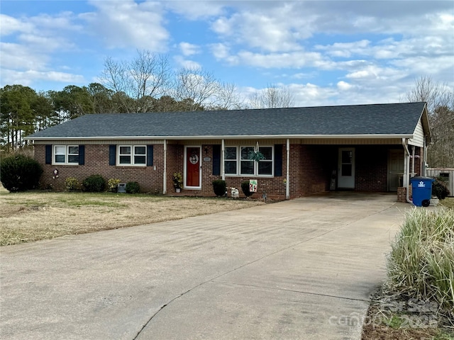 single story home with a carport