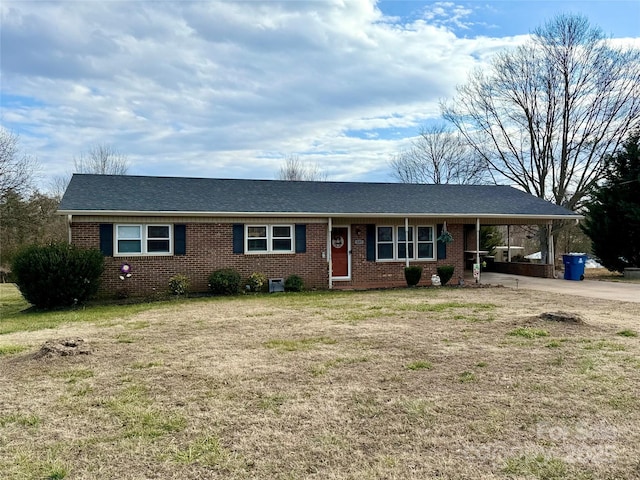 single story home with a carport and a front yard