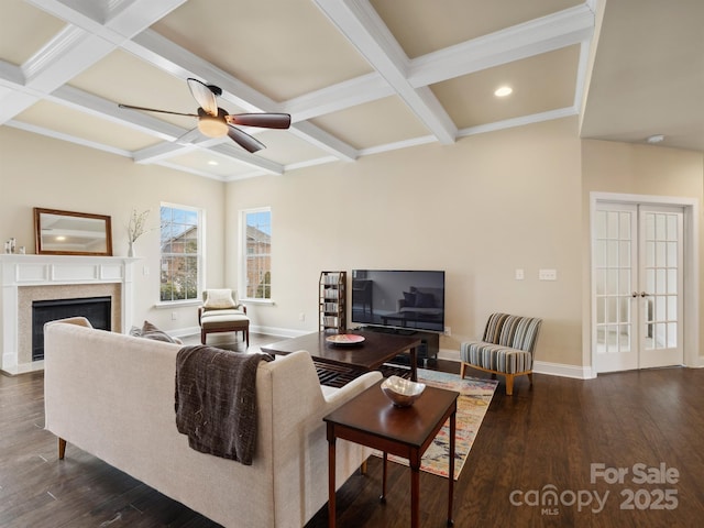 living room featuring dark wood-style flooring, coffered ceiling, baseboards, french doors, and beam ceiling