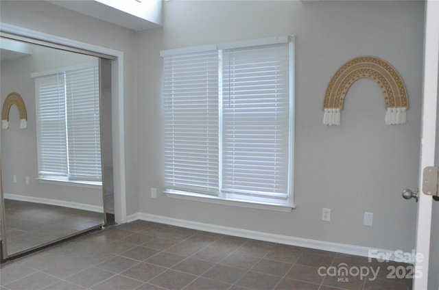 empty room featuring tile patterned flooring