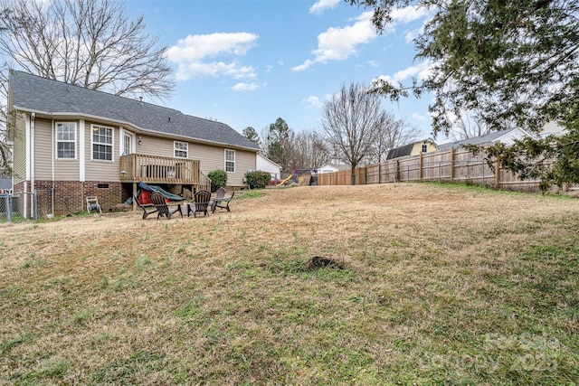 view of yard with a wooden deck