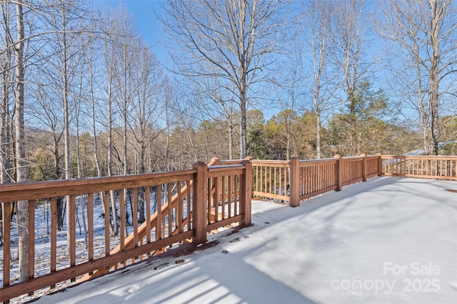 view of snow covered deck