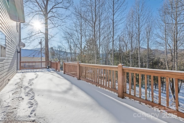 view of snow covered deck