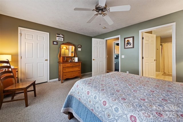 bedroom with ceiling fan, a textured ceiling, and light carpet