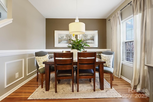 dining room featuring wood-type flooring