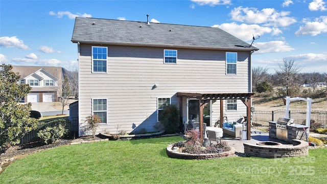 rear view of property with a fire pit, a yard, a pergola, and a patio