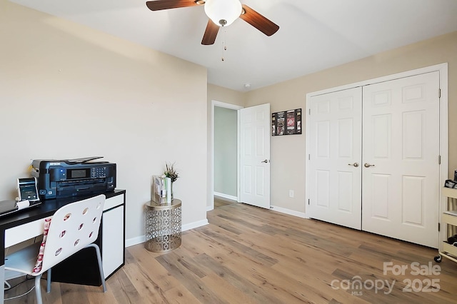 office area with hardwood / wood-style flooring and ceiling fan