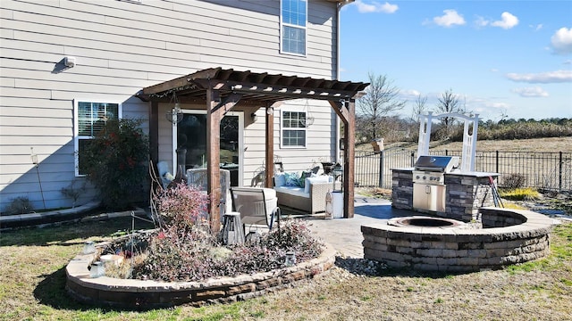 view of patio featuring a fire pit, area for grilling, and a pergola