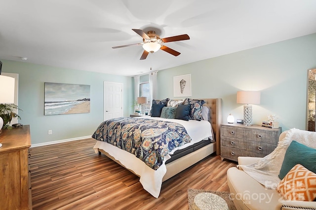 bedroom featuring hardwood / wood-style flooring and ceiling fan