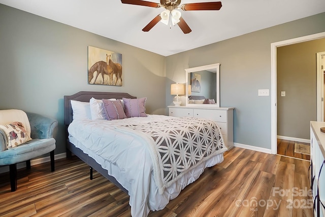 bedroom featuring dark hardwood / wood-style floors and ceiling fan