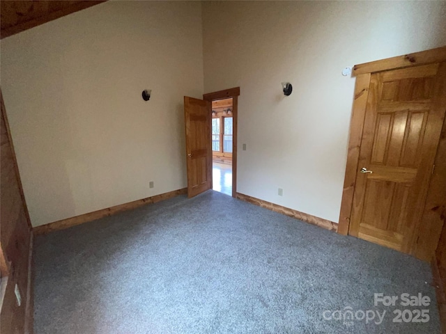 unfurnished room featuring carpet floors