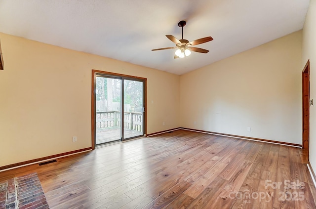 spare room with light hardwood / wood-style floors and ceiling fan