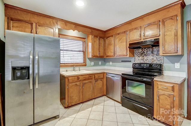 kitchen featuring sink, light tile patterned floors, and appliances with stainless steel finishes