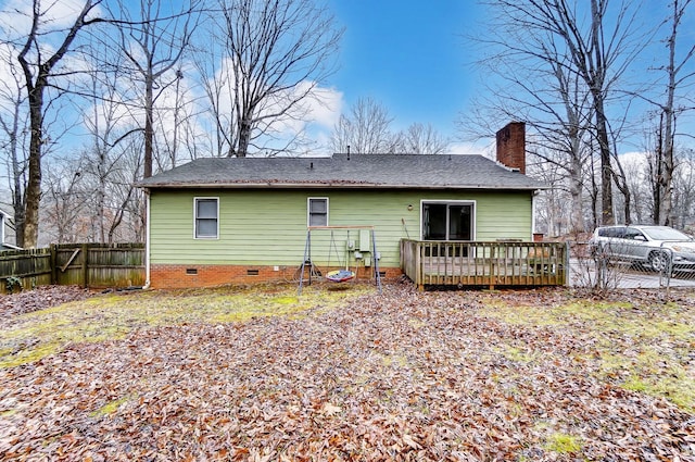 back of property featuring a deck