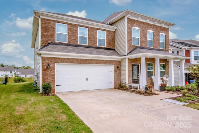 view of front facade with a garage, driveway, brick siding, and a front yard