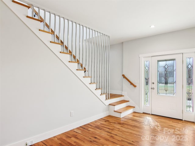 entrance foyer with hardwood / wood-style flooring