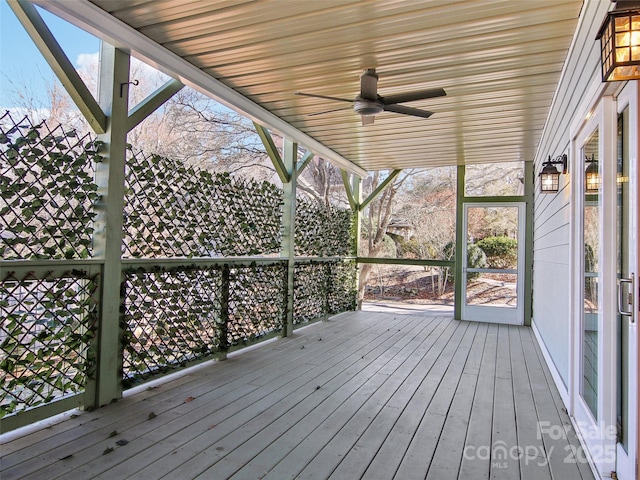 wooden deck with ceiling fan