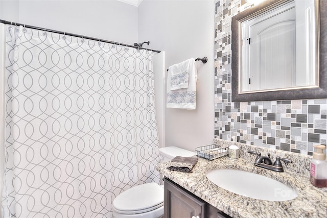 bathroom with a shower with curtain, backsplash, toilet, and vanity