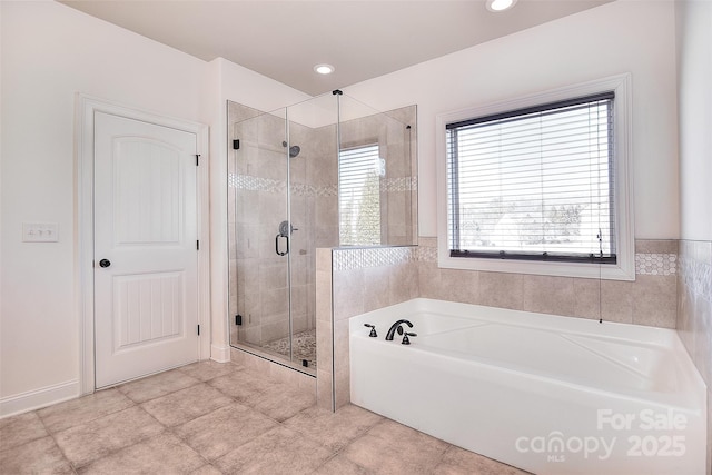 bathroom with a stall shower, tile patterned flooring, a bath, and recessed lighting