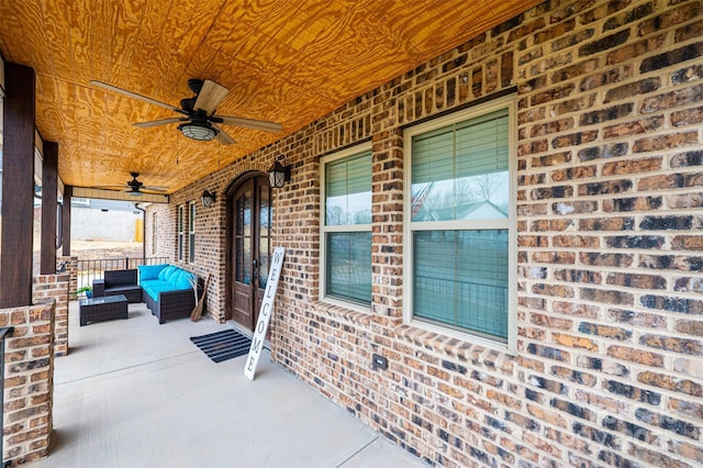 view of patio with covered porch, outdoor lounge area, and ceiling fan