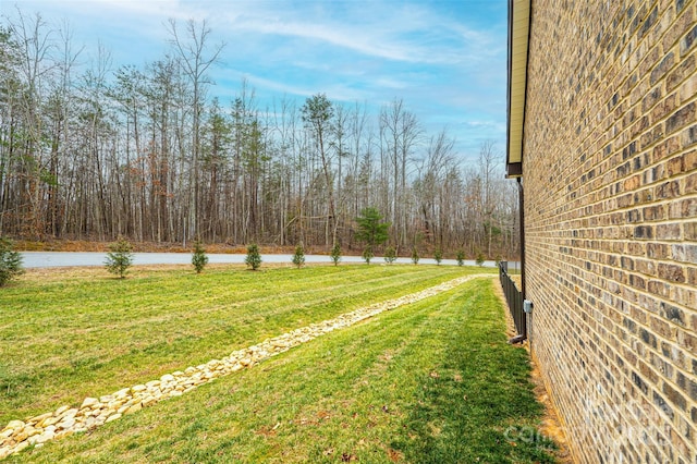 view of yard with a water view