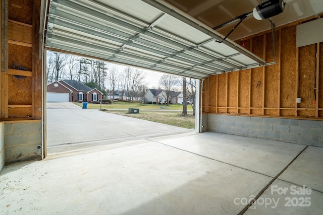 garage featuring a garage door opener