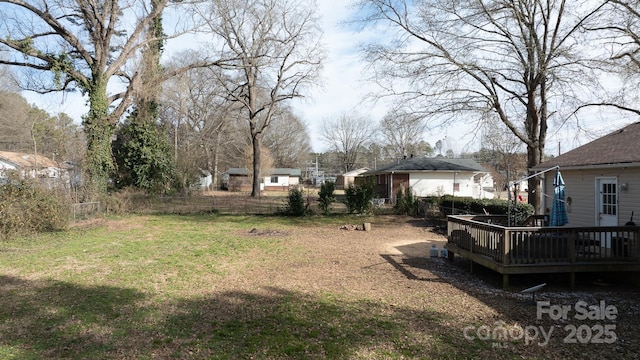 view of yard featuring a deck