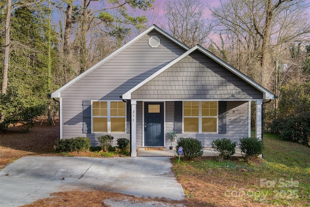 bungalow-style home featuring a porch