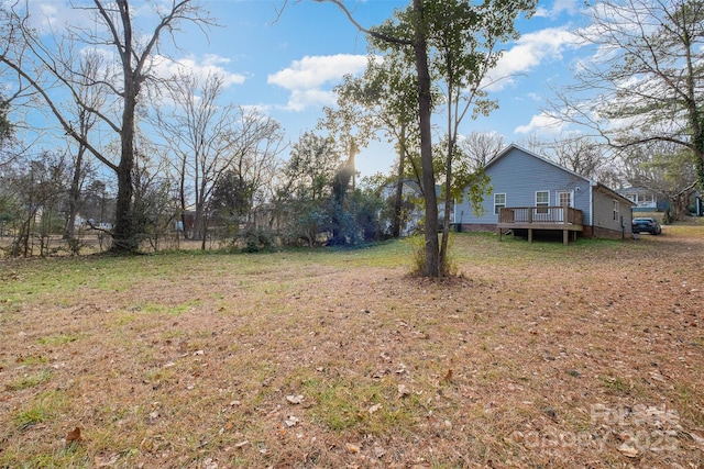 view of yard featuring a deck