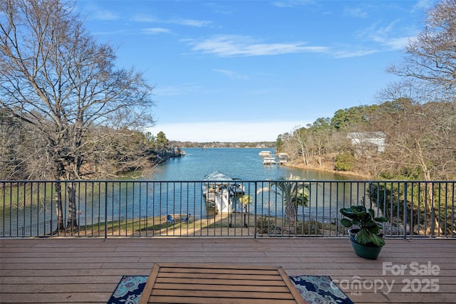 wooden terrace with a water view