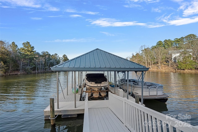 dock area featuring a water view