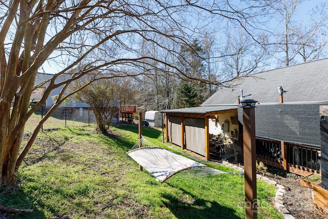 view of yard with fence