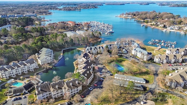 birds eye view of property featuring a water view