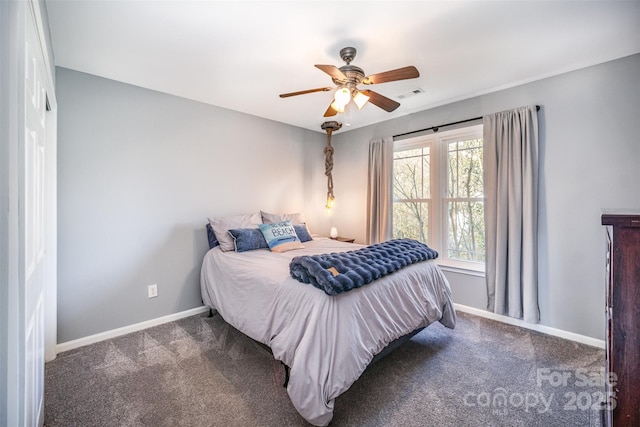 bedroom featuring ceiling fan, carpet, visible vents, and baseboards